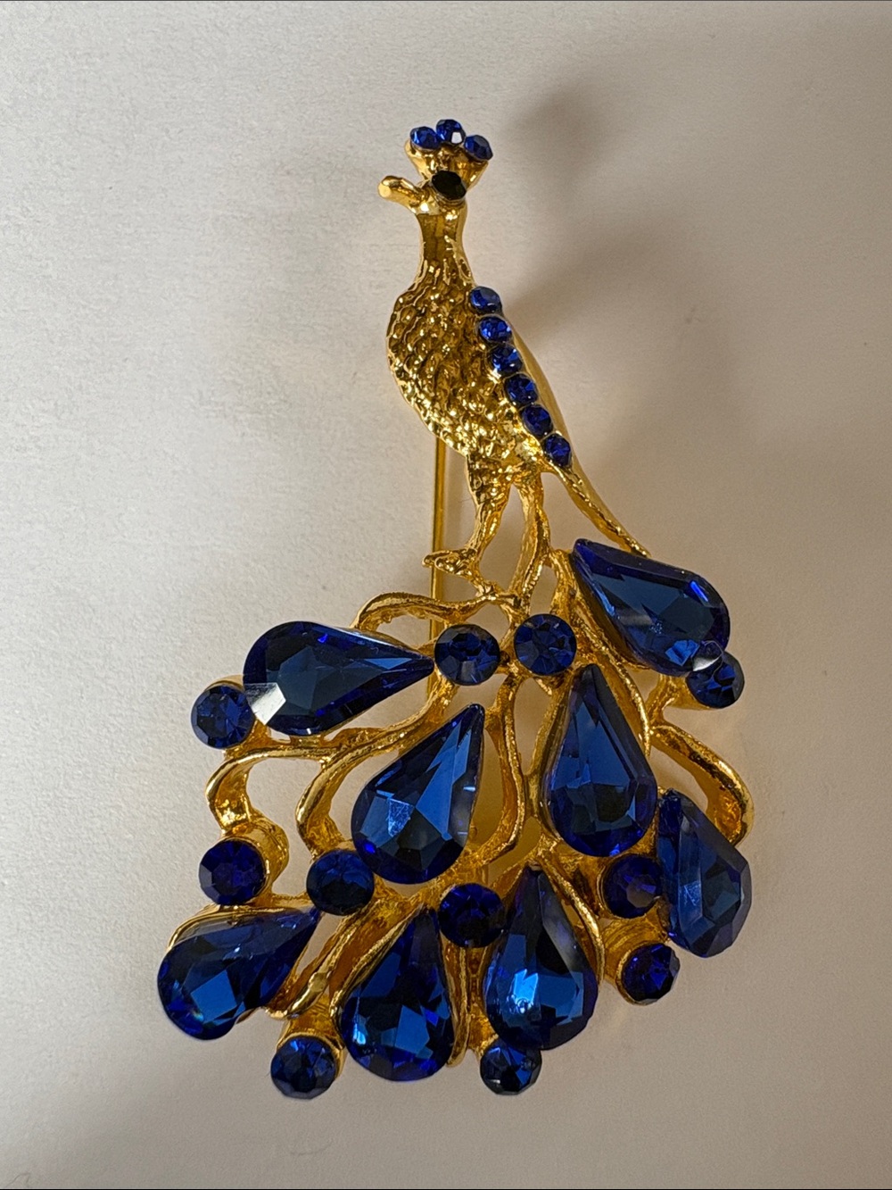 Gold Peacock Brooch with Royal Blue Crystal Accents - Picture 1 of 3